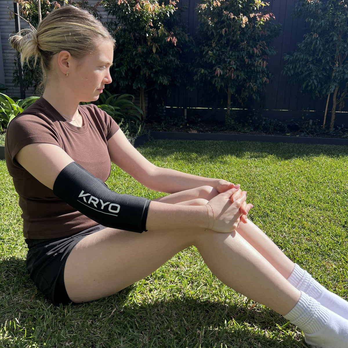 KRYO FLEX cold compression sleeve worn on the arm and elbow for post-training recovery