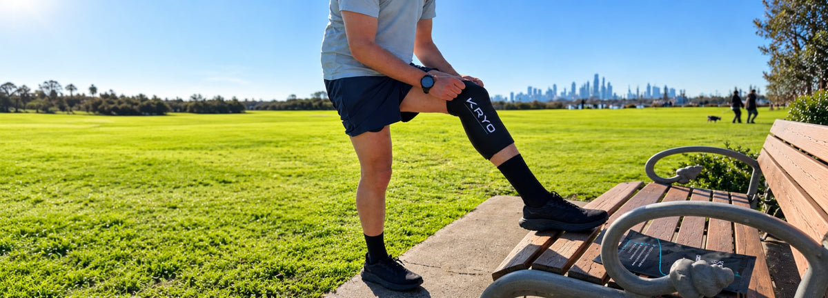 Runner wearing KRYO ice compression sleeve on knee after training in Melbourne