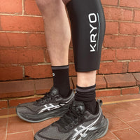 KRYO CORE calf ice compression sleeve worn after running for targeted cold therapy and post-run recovery