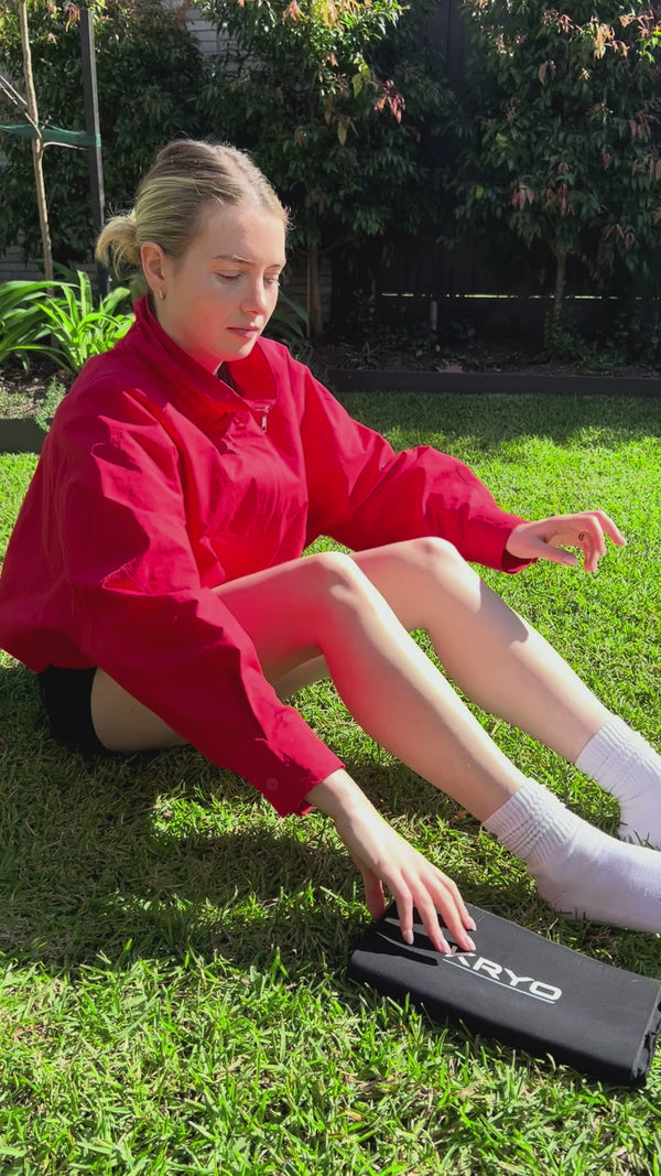 KRYO MAX cold compression sleeve worn on the thigh for post-training quad and hamstring recovery